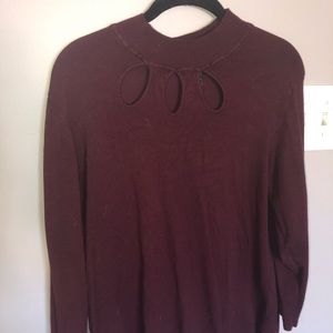sweater with hole design on neck line